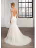 Mermaid Ivory Tulle Beaded Long Sleeves Sheer Back Wedding Dress